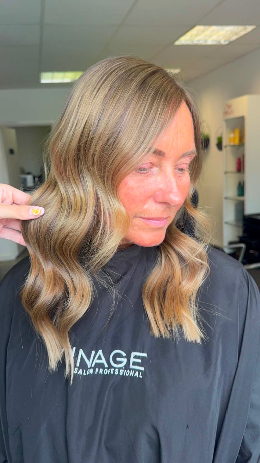 Bronde mid-length hair with soft, lived-in waves